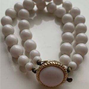 Vintage unbranded double strand white bead bracelet with cabochon clasp